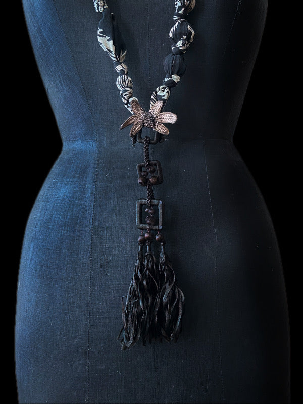 Aesthetic Movement inspired long silk sautoir necklace with antique tassel embellishment. Bohemian style from vintage textiles by Pavilion Parade. 