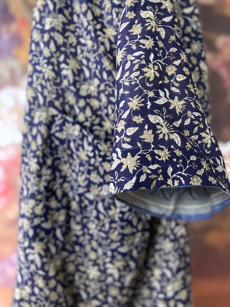 Faded indigo hand block printed fine cotton kaftan dress. Deep V neck, patch pockets, fully reversible. Bohemian style sustainably created from antique and vintage textiles by the Pavilion Parade studioi.