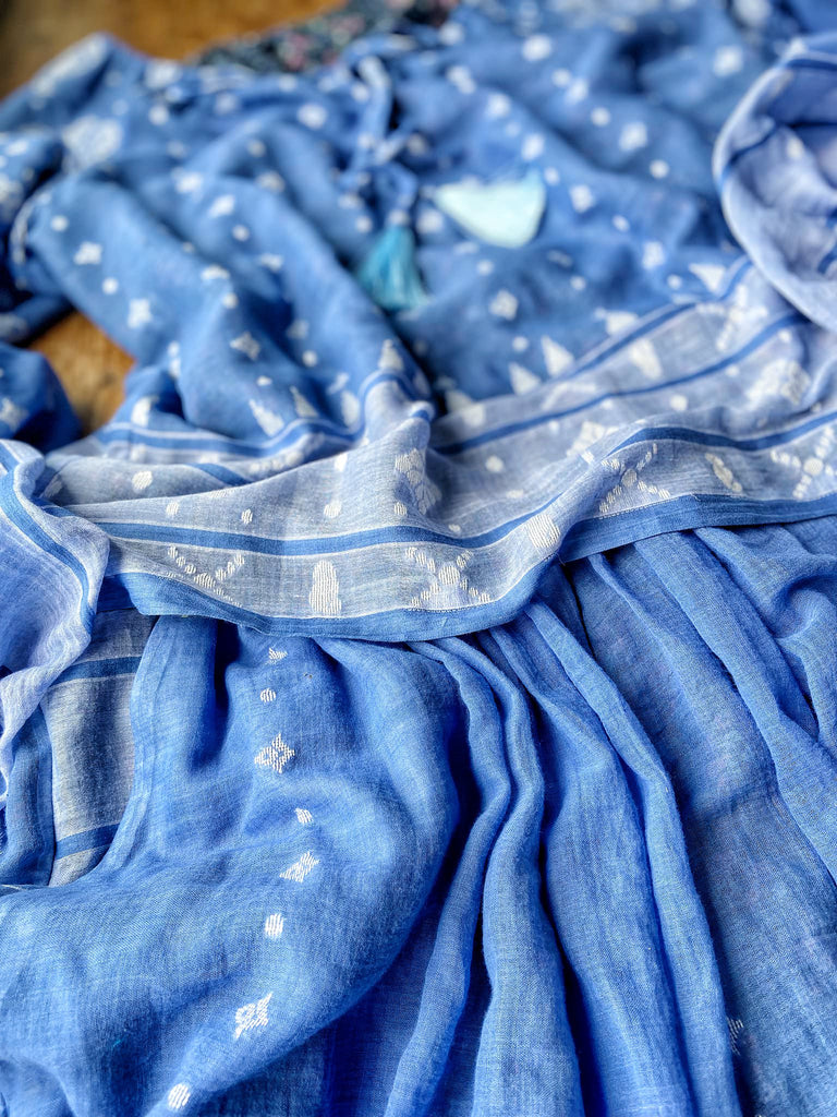 Fine soft pure cotton weave in a fresh sky blue and white palette. Full sleeved faded indigo peasant blouse and full dirndl skirt. Bohemian styles created from vintage textiles by Pavilion parade studio. 