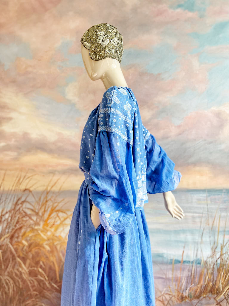 Fine soft pure cotton weave in a fresh sky blue and white palette. Full sleeved faded indigo peasant blouse and full dirndl skirt. Bohemian styles created from vintage textiles by Pavilion parade studio. 