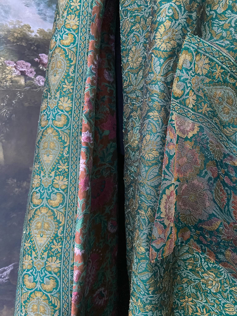 Emerald green, gold and copper silk brocade dressing robe or duster coat with full sleeves, oversize pockets and tassel sash. Bohemian style created from antique and vintage textiles by the Pavilion Parade studio