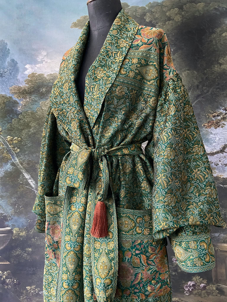 Emerald green, gold and copper silk brocade dressing robe or duster coat with full sleeves, oversize pockets and tassel sash. Bohemian style created from antique and vintage textiles by the Pavilion Parade studio