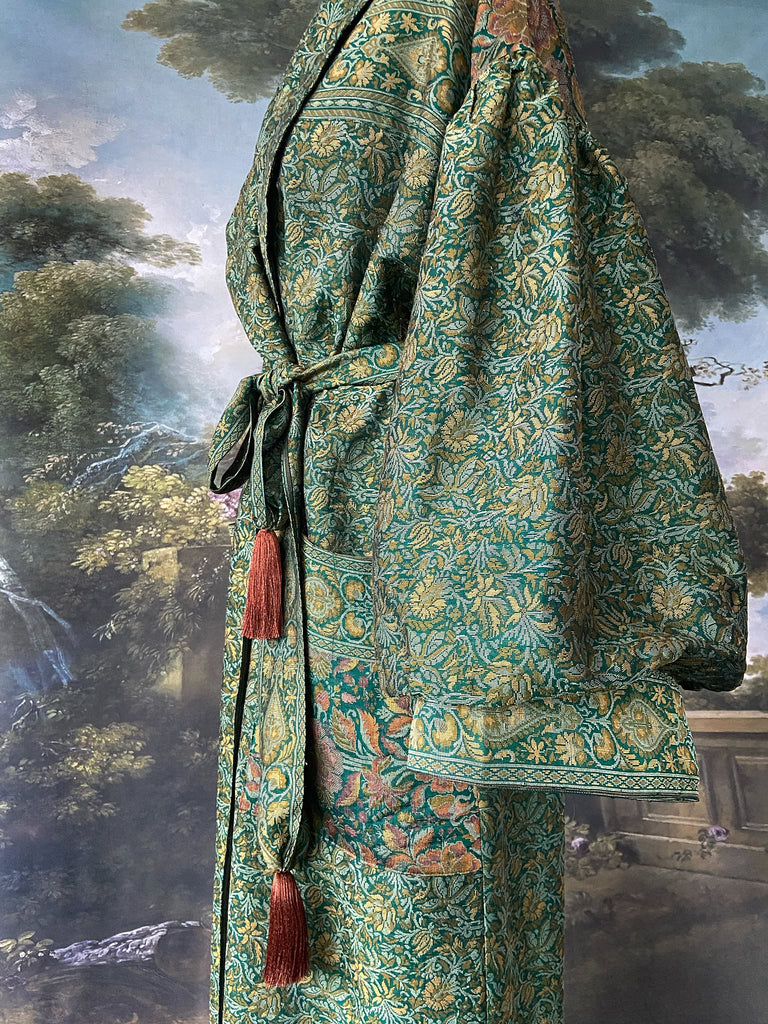 Emerald green, gold and copper silk brocade dressing robe or duster coat with full sleeves, oversize pockets and tassel sash. Bohemian style created from antique and vintage textiles by the Pavilion Parade studio