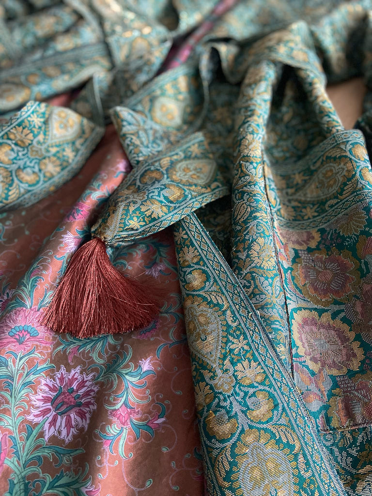 Emerald green, gold and copper silk brocade dressing robe or duster coat with full sleeves, oversize pockets and tassel sash. Bohemian style created from antique and vintage textiles by the Pavilion Parade studio