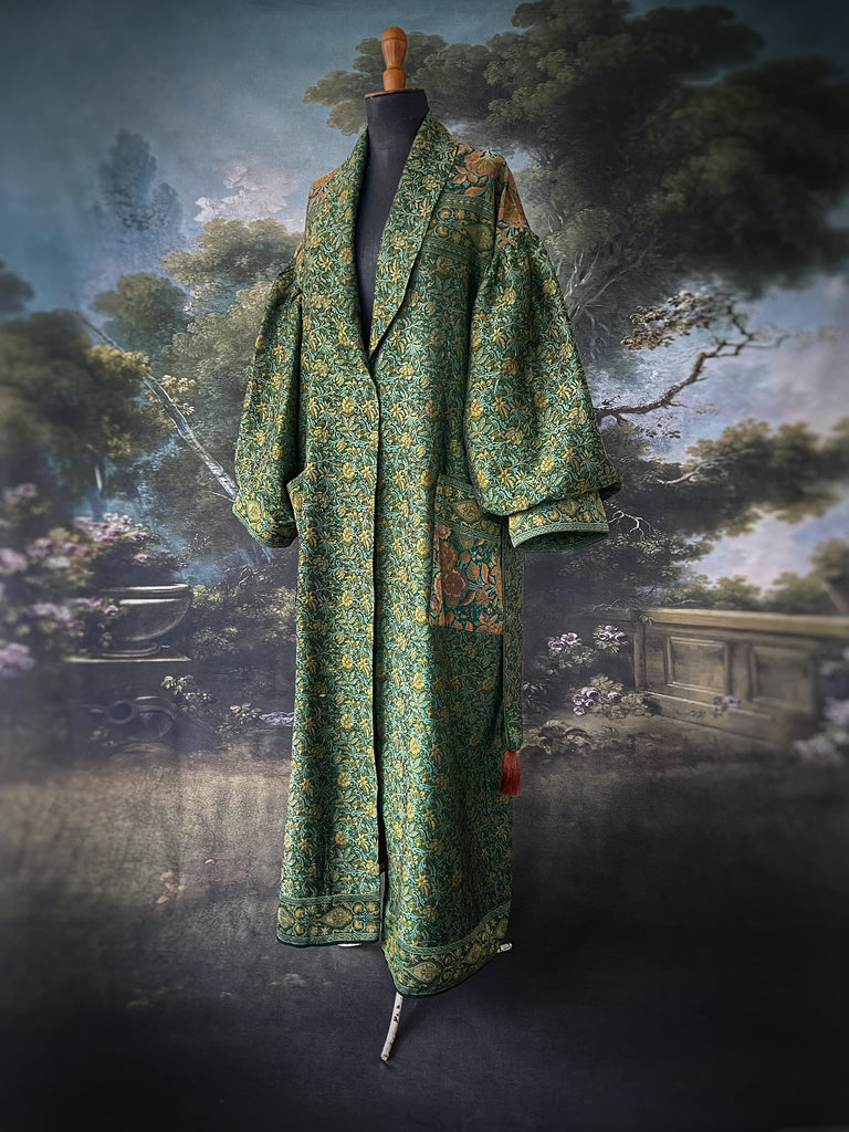 Emerald green, gold and copper silk brocade dressing robe or duster coat with full sleeves, oversize pockets and tassel sash. Bohemian style created from antique and vintage textiles by the Pavilion Parade studio