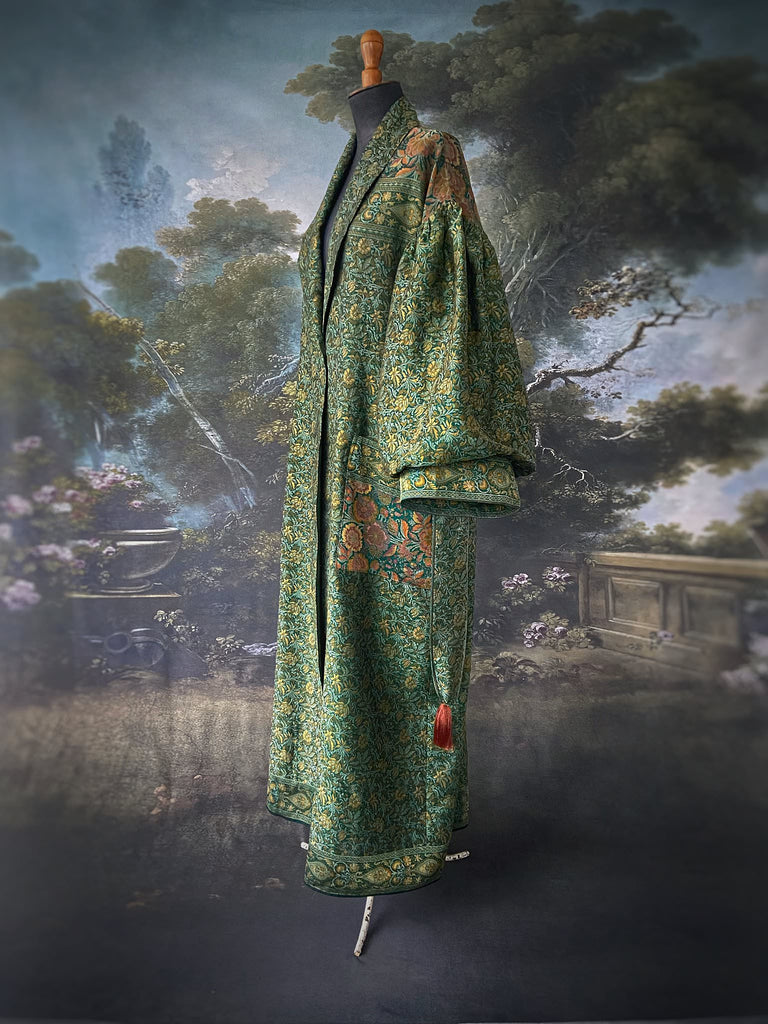Emerald green, gold and copper silk brocade dressing robe or duster coat with full sleeves, oversize pockets and tassel sash. Bohemian style created from antique and vintage textiles by the Pavilion Parade studio