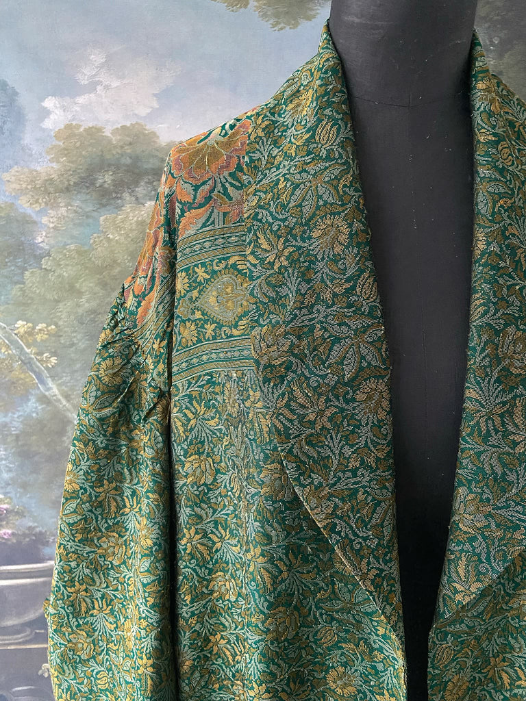 Emerald green, gold and copper silk brocade dressing robe or duster coat with full sleeves, oversize pockets and tassel sash. Bohemian style created from antique and vintage textiles by the Pavilion Parade studio