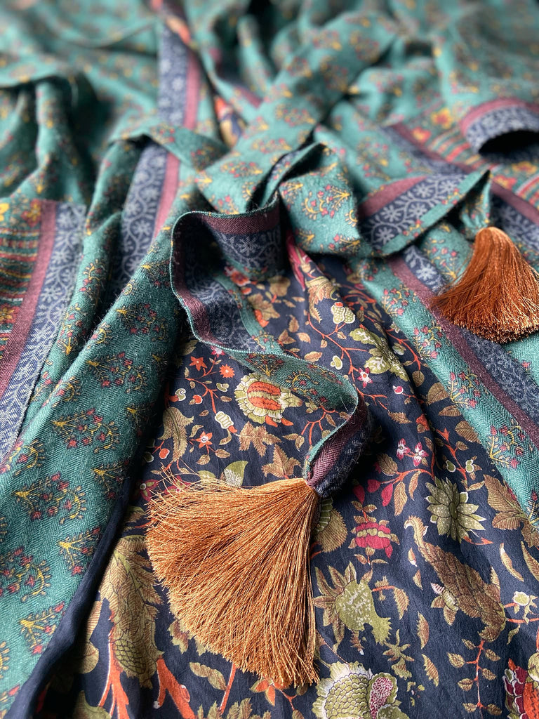 Forest green, conker brown and saffron yellow floral fine wool robe with silk lining. Wide sleeves, deep pockets and tassel sash. Unique bohemian style created from vintage and antique textiles by the Pavilion Parade studio.