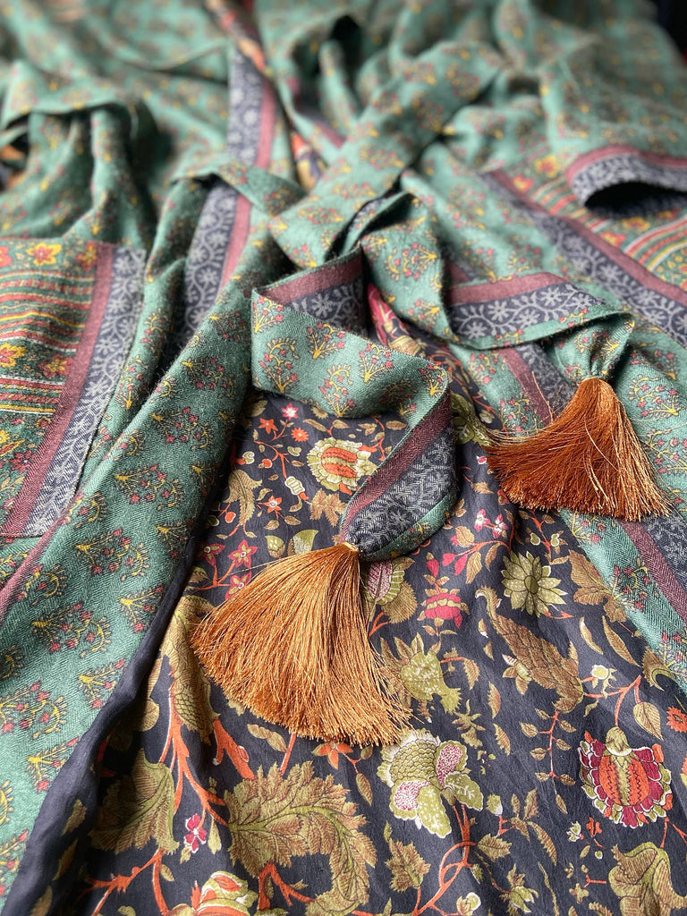 Forest green, conker brown and saffron yellow floral fine wool robe with silk lining. Wide sleeves, deep pockets and tassel sash. Unique bohemian style created from vintage and antique textiles by the Pavilion Parade studio.