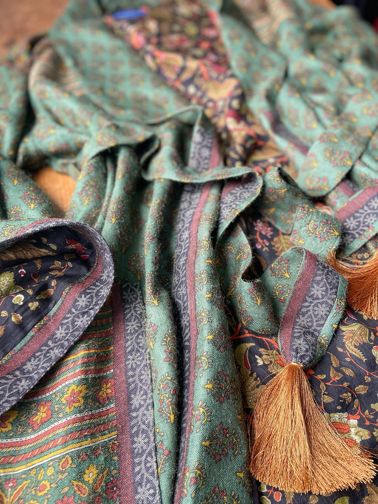 Forest green, conker brown and saffron yellow floral fine wool robe with silk lining. Wide sleeves, deep pockets and tassel sash. Unique bohemian style created from vintage and antique textiles by the Pavilion Parade studio.