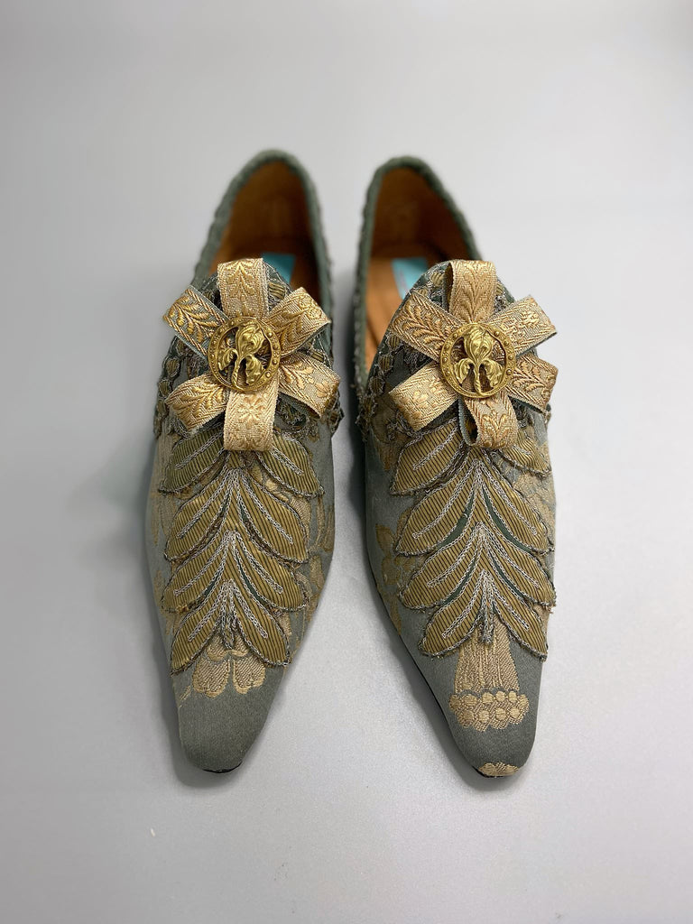 French grey and gold silk brocade shoes with Belle Epoque iris rosettes. Bohemian style created from antique textiles by the Pavilion Parade studio.
