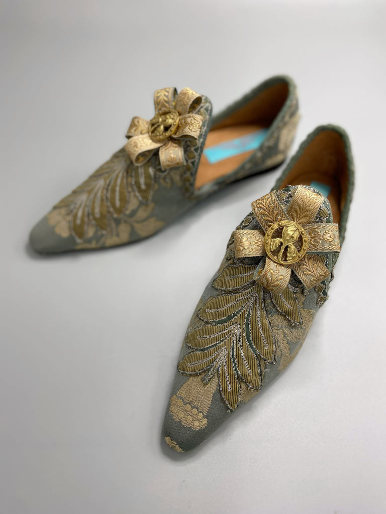 French grey and gold silk brocade shoes with Belle Epoque iris rosettes. Bohemian style created from antique textiles by the Pavilion Parade studio.