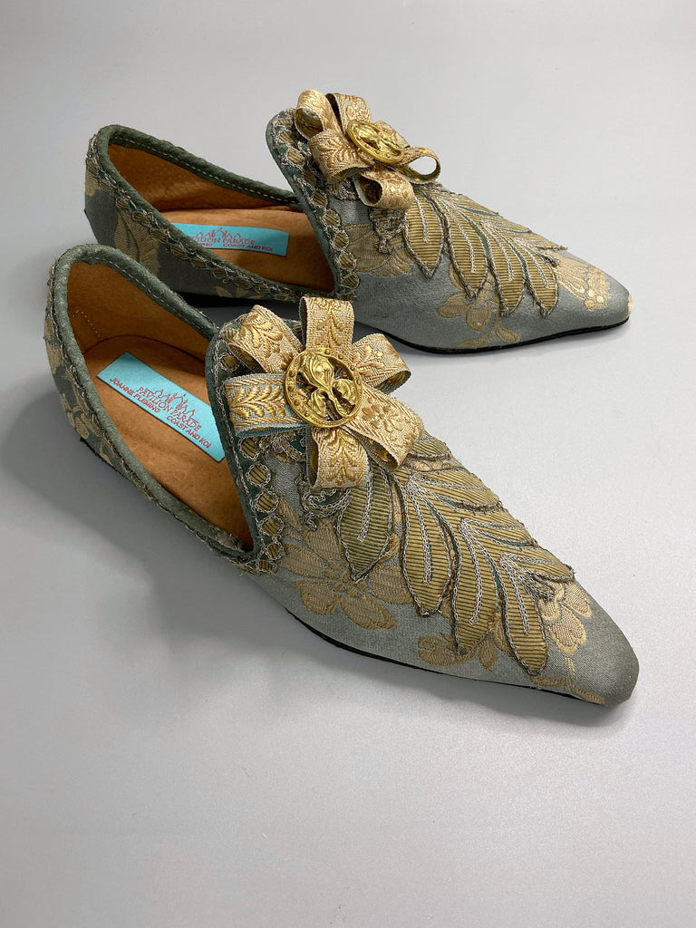 French grey and gold silk brocade shoes with Belle Epoque iris rosettes. Bohemian style created from antique textiles by the Pavilion Parade studio.