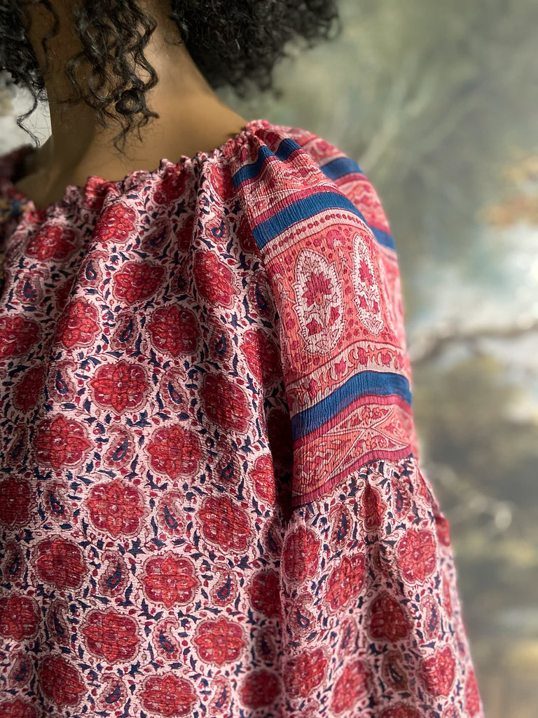 Garnet, Prussian blue and pink silk chiffon blouse with long full sleeves and adjustable drawstring neckline. Bohemian styles sustainably created from antique and vintage textiles by the Pavilion Parade studio. 