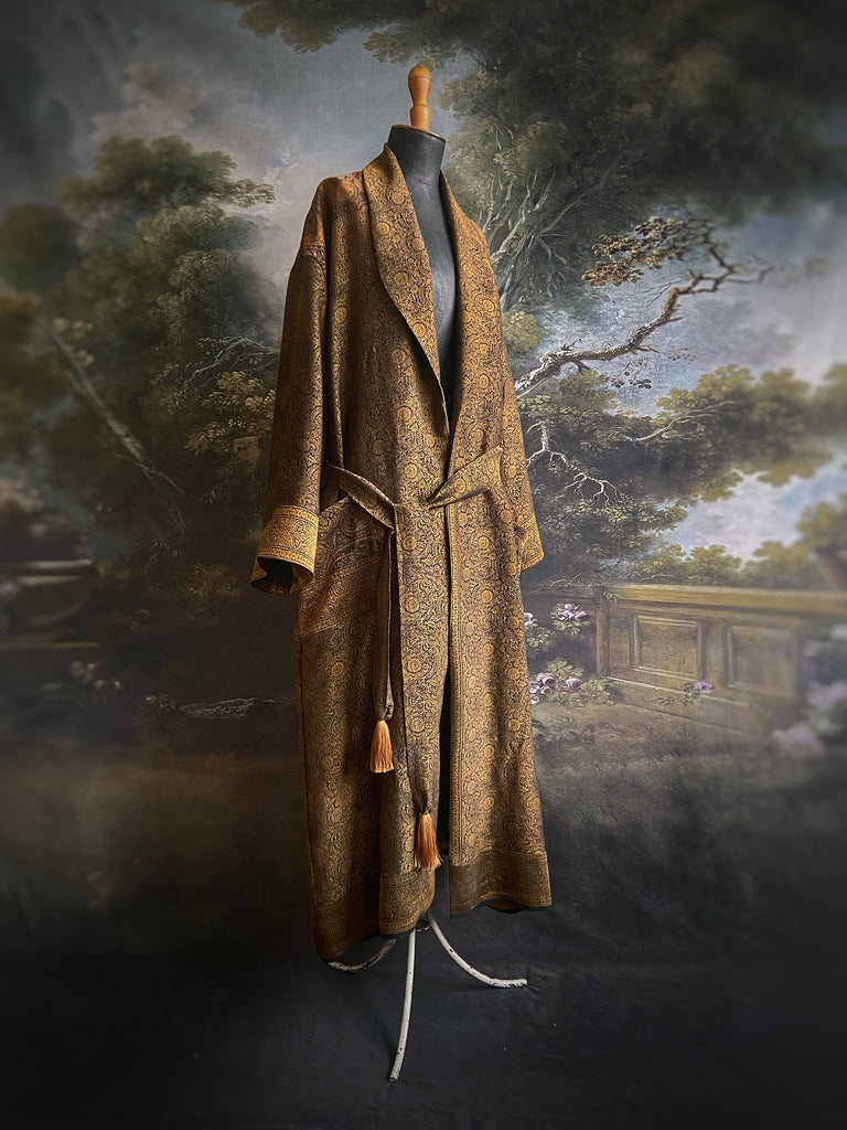 Gold and black silk brocade luxury dressing robe with printed silk lining and tassel sash. Bohemian style created from antique and vintage textiles by the Pavilion Parade studio.
