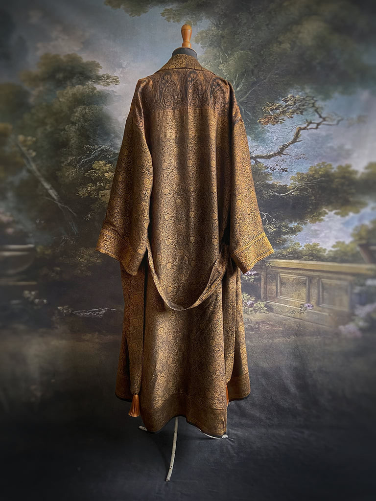 Gold and black silk brocade luxury dressing robe with printed silk lining and tassel sash. Bohemian style created from antique and vintage textiles by the Pavilion Parade studio.