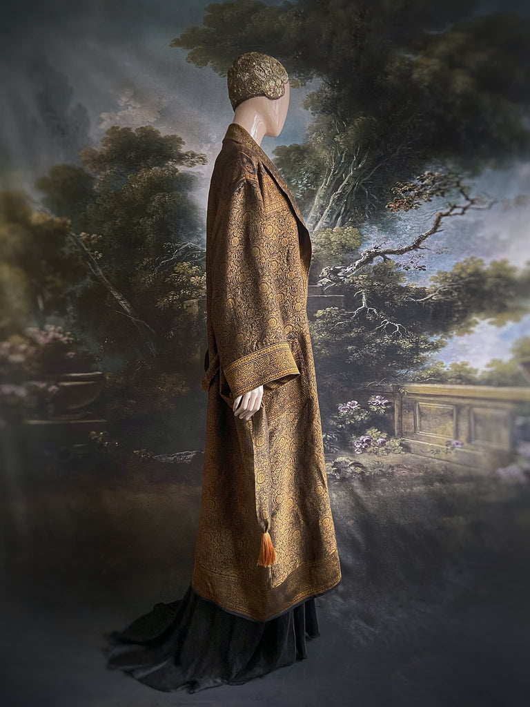 Gold and black silk brocade luxury dressing robe with printed silk lining and tassel sash. Bohemian style created from antique and vintage textiles by the Pavilion Parade studio.