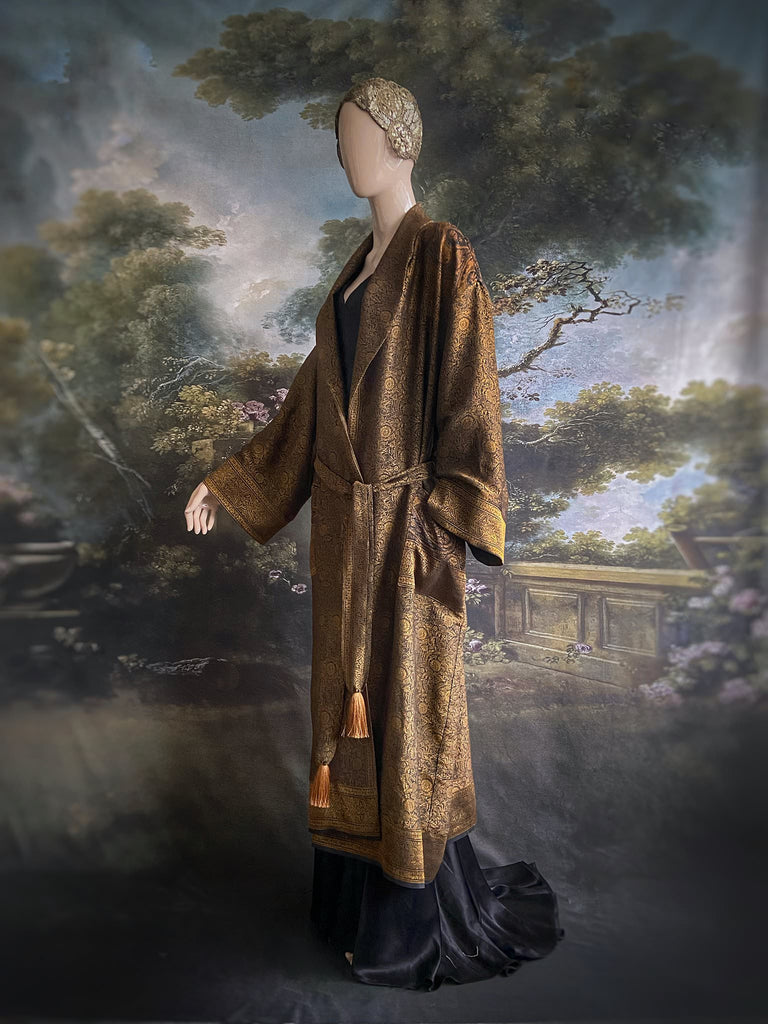 Gold and black silk brocade luxury dressing robe with printed silk lining and tassel sash. Bohemian style created from antique and vintage textiles by the Pavilion Parade studio.