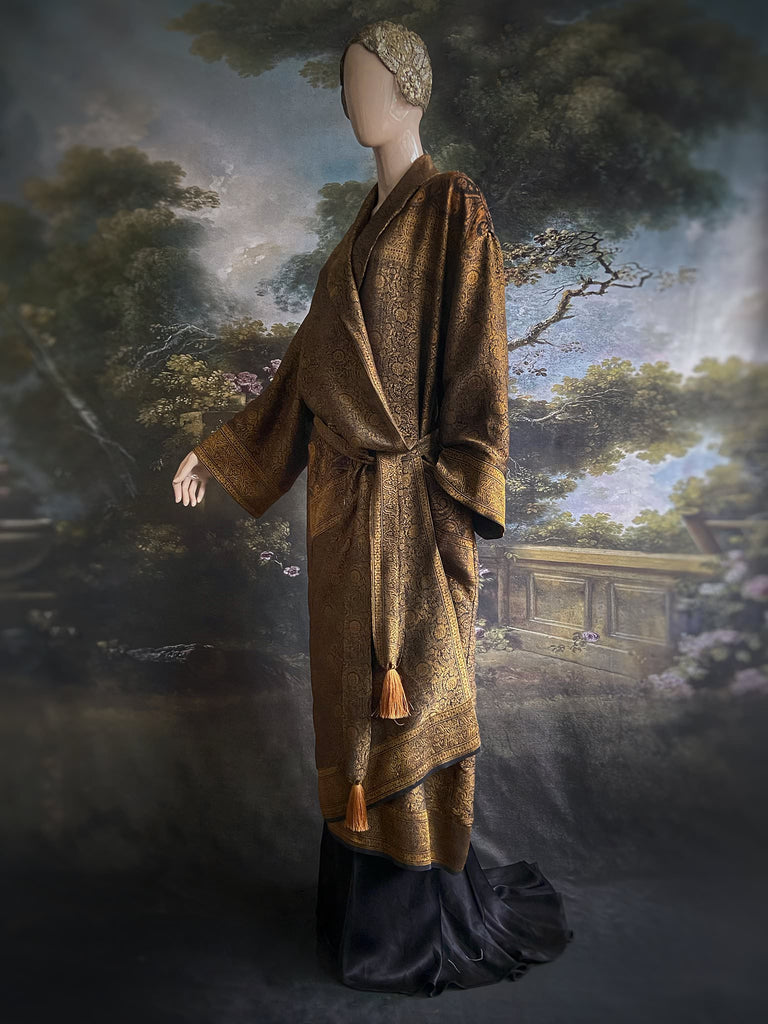 Gold and black silk brocade luxury dressing robe with printed silk lining and tassel sash. Bohemian style created from antique and vintage textiles by the Pavilion Parade studio.