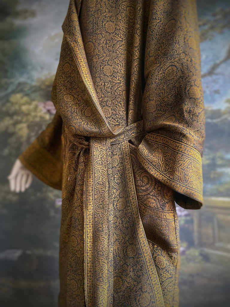 Gold and black silk brocade luxury dressing robe with printed silk lining and tassel sash. Bohemian style created from antique and vintage textiles by the Pavilion Parade studio.
