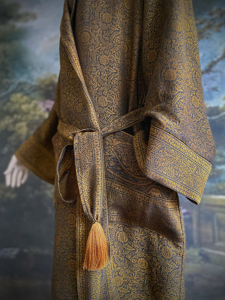 Gold and black silk brocade luxury dressing robe with printed silk lining and tassel sash. Bohemian style created from antique and vintage textiles by the Pavilion Parade studio.