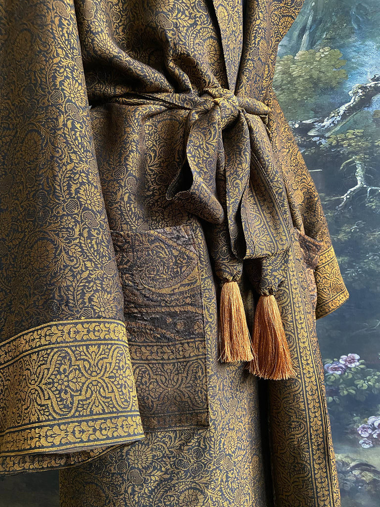 Gold and black silk brocade luxury dressing robe with printed silk lining and tassel sash. Bohemian style created from antique and vintage textiles by the Pavilion Parade studio.