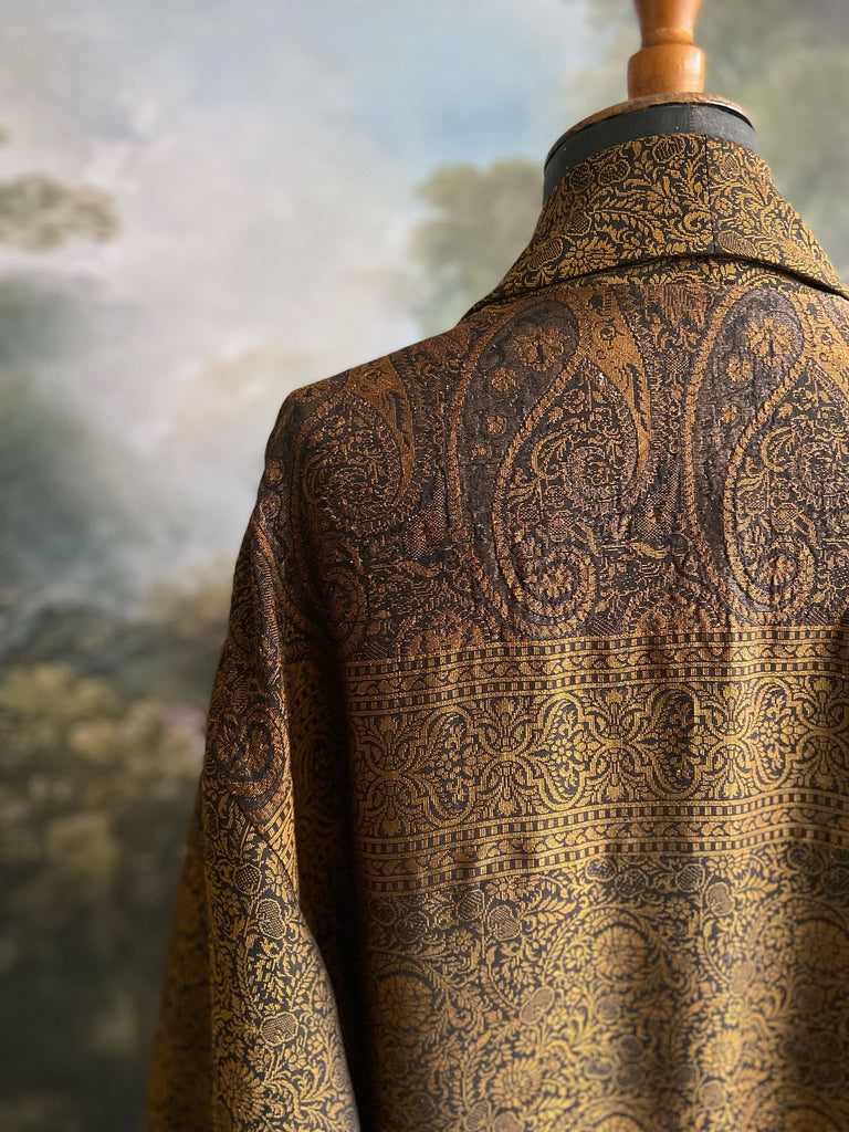 Gold and black silk brocade luxury dressing robe with printed silk lining and tassel sash. Bohemian style created from antique and vintage textiles by the Pavilion Parade studio.