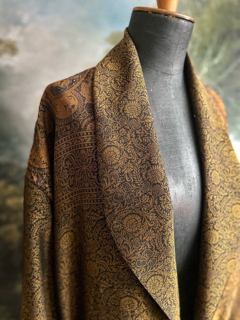 Gold and black silk brocade luxury dressing robe with printed silk lining and tassel sash. Bohemian style created from antique and vintage textiles by the Pavilion Parade studio.