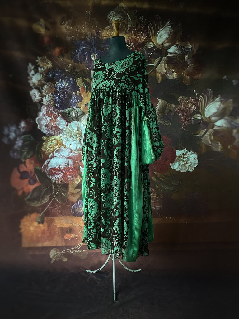 Jade green and chocolate silk georgette floral print maxi dress with full balloon sleeves and side pockets. Bohemian styles created from antique and vintage textiles by the Pavilion Parade studio.