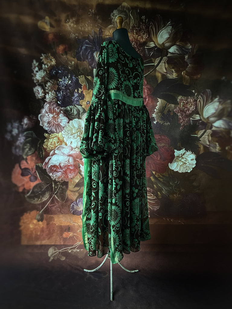 Jade green and chocolate silk georgette floral print maxi dress with full balloon sleeves and side pockets. Bohemian styles created from antique and vintage textiles by the Pavilion Parade studio.