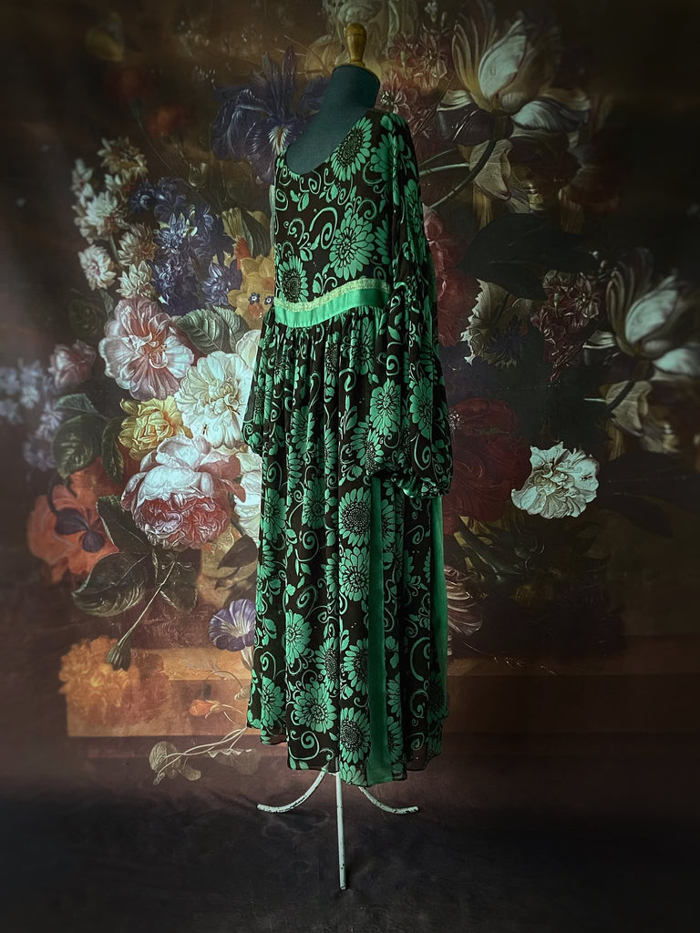 Jade green and chocolate silk georgette floral print maxi dress with full balloon sleeves and side pockets. Bohemian styles created from antique and vintage textiles by the Pavilion Parade studio.