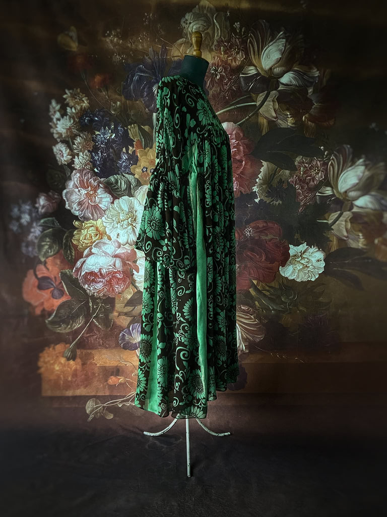 Jade green and chocolate silk georgette floral print maxi dress with full balloon sleeves and side pockets. Bohemian styles created from antique and vintage textiles by the Pavilion Parade studio.