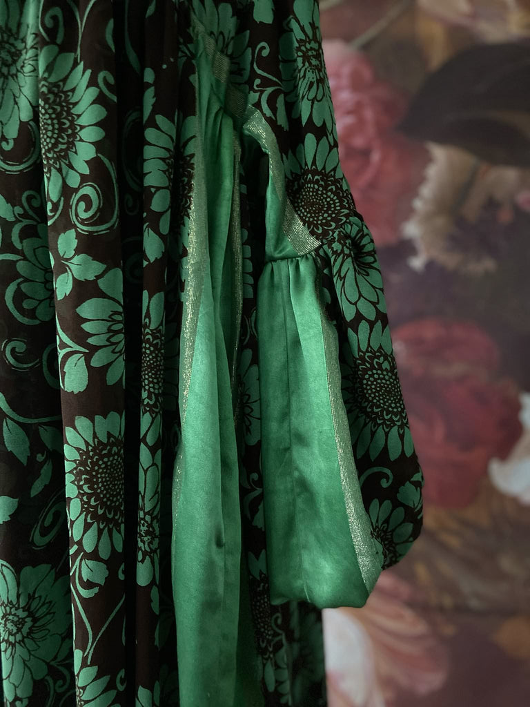 Jade green and chocolate silk georgette floral print maxi dress with full balloon sleeves and side pockets. Bohemian styles created from antique and vintage textiles by the Pavilion Parade studio.