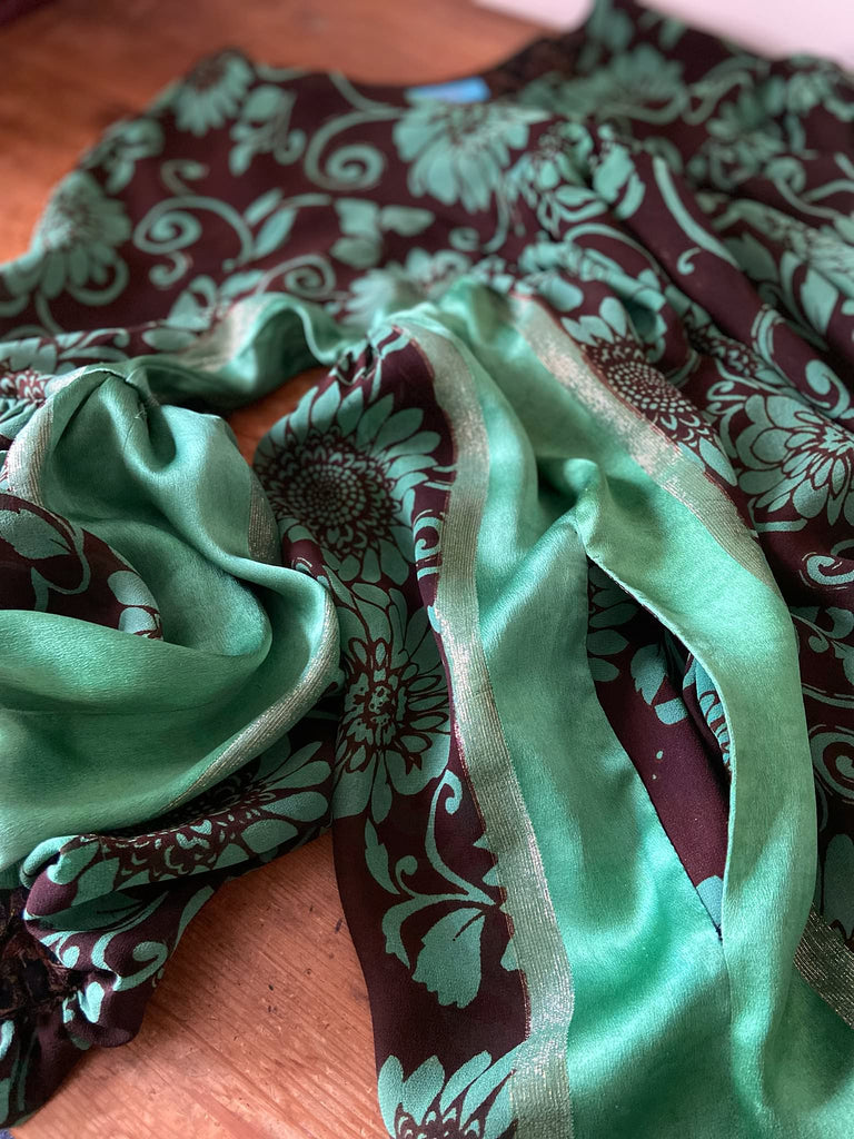 Jade green and chocolate silk georgette floral print maxi dress with full balloon sleeves and side pockets. Bohemian styles created from antique and vintage textiles by the Pavilion Parade studio.