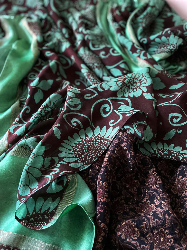 Jade green and chocolate silk georgette floral print maxi dress with full balloon sleeves and side pockets. Bohemian styles created from antique and vintage textiles by the Pavilion Parade studio.