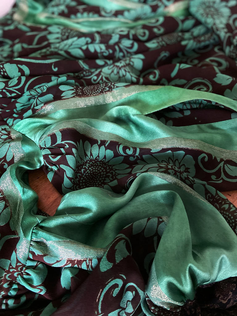 Jade green and chocolate silk georgette floral print maxi dress with full balloon sleeves and side pockets. Bohemian styles created from antique and vintage textiles by the Pavilion Parade studio.