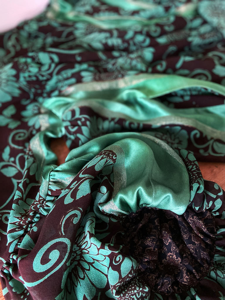Jade green and chocolate silk georgette floral print maxi dress with full balloon sleeves and side pockets. Bohemian styles created from antique and vintage textiles by the Pavilion Parade studio.