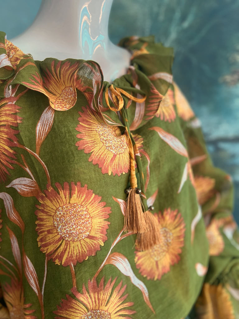 Acid green and sunflower yellow cotton muslin block printed blouse with long full sleeves and adjustable drawstring neckline. Bohemian styles sustainably created from antique and vintage textiles by the Pavilion Parade studio. 