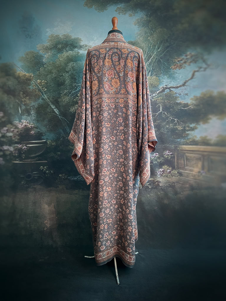 Full length 1920s inspired kimono robe with large patch pockets. Newly created from a grey, peach and apricot vintage silk crepe. Fully lined in silk with French seams throughout. Bohemian styles sustainably created from antique and vintage textiles by the Pavilion Parade studio.