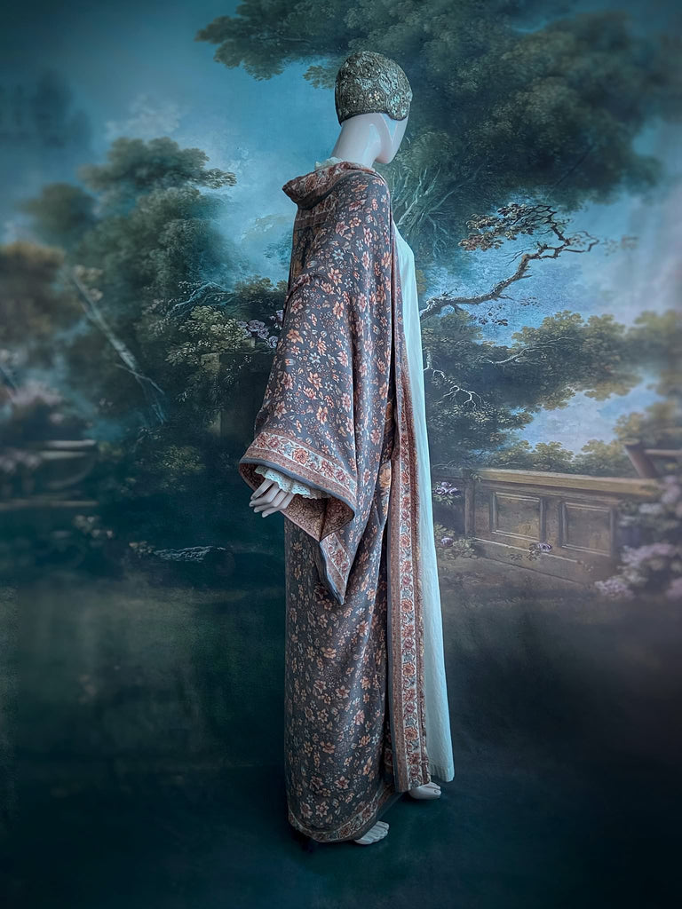 Full length 1920s inspired kimono robe with large patch pockets. Newly created from a grey, peach and apricot vintage silk crepe. Fully lined in silk with French seams throughout. Bohemian styles sustainably created from antique and vintage textiles by the Pavilion Parade studio.