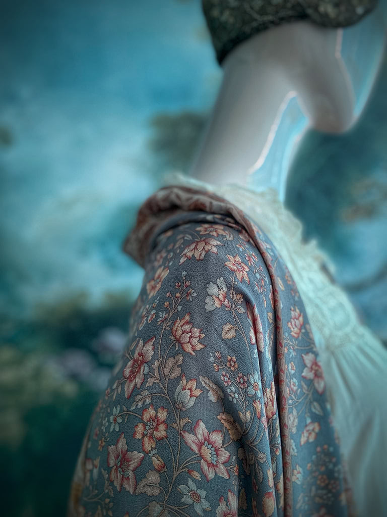 Full length 1920s inspired kimono robe with large patch pockets. Newly created from a grey, peach and apricot vintage silk crepe. Fully lined in silk with French seams throughout. Bohemian styles sustainably created from antique and vintage textiles by the Pavilion Parade studio.