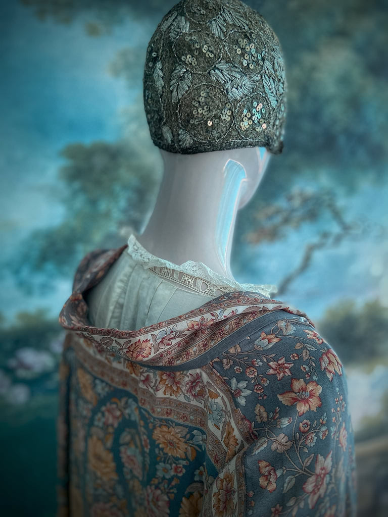 Full length 1920s inspired kimono robe with large patch pockets. Newly created from a grey, peach and apricot vintage silk crepe. Fully lined in silk with French seams throughout. Bohemian styles sustainably created from antique and vintage textiles by the Pavilion Parade studio.