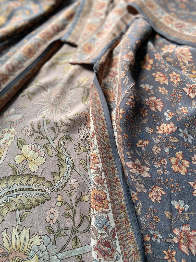 Full length 1920s inspired kimono robe with large patch pockets. Newly created from a grey, peach and apricot vintage silk crepe. Fully lined in silk with French seams throughout. Bohemian styles sustainably created from antique and vintage textiles by the Pavilion Parade studio.