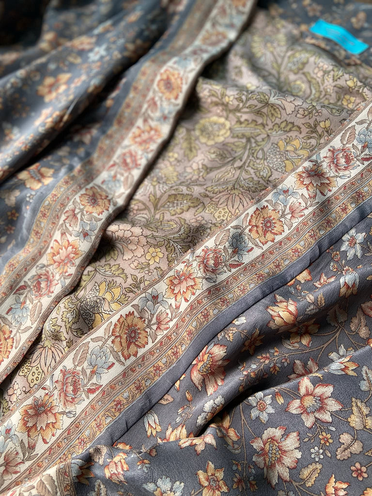 Full length 1920s inspired kimono robe with large patch pockets. Newly created from a grey, peach and apricot vintage silk crepe. Fully lined in silk with French seams throughout. Bohemian styles sustainably created from antique and vintage textiles by the Pavilion Parade studio.