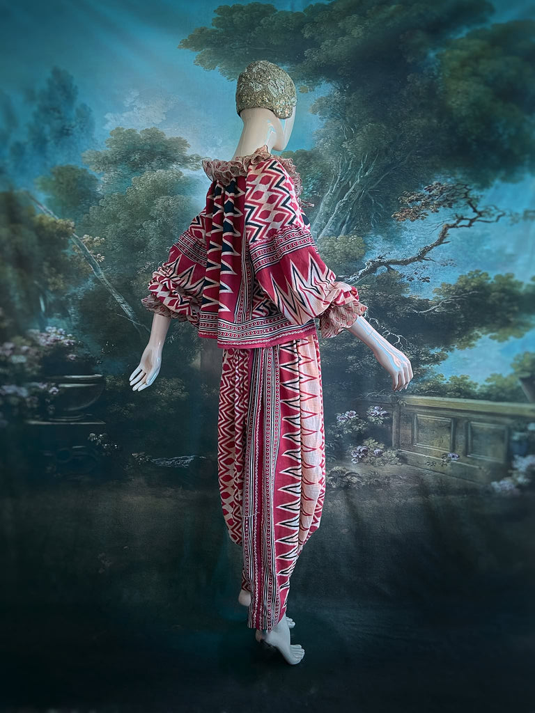 Red, black and ivory fine cotton Harlequin Corsair inspired beach pyjamas with full sleeved frill collar blouse and drawstring Ottoman harem pants. Bohemian styles created from  vintage and antique textiles by the Pavilion Parade studio