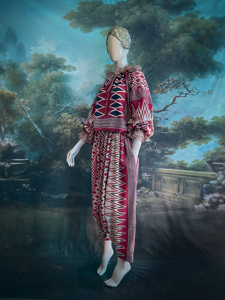 Red, black and ivory fine cotton Harlequin Corsair inspired beach pyjamas with full sleeved frill collar blouse and drawstring Ottoman harem pants. Bohemian styles created from  vintage and antique textiles by the Pavilion Parade studio