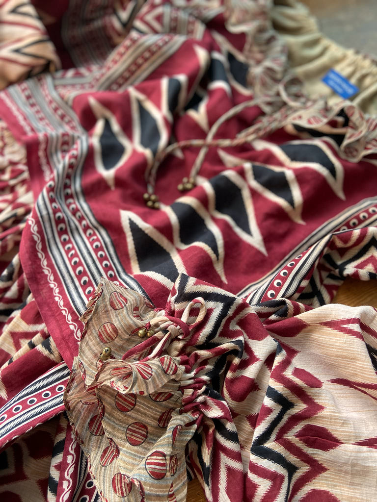 Red, black and ivory fine cotton Harlequin Corsair inspired beach pyjamas with full sleeved frill collar blouse and drawstring Ottoman harem pants. Bohemian styles created from  vintage and antique textiles by the Pavilion Parade studio