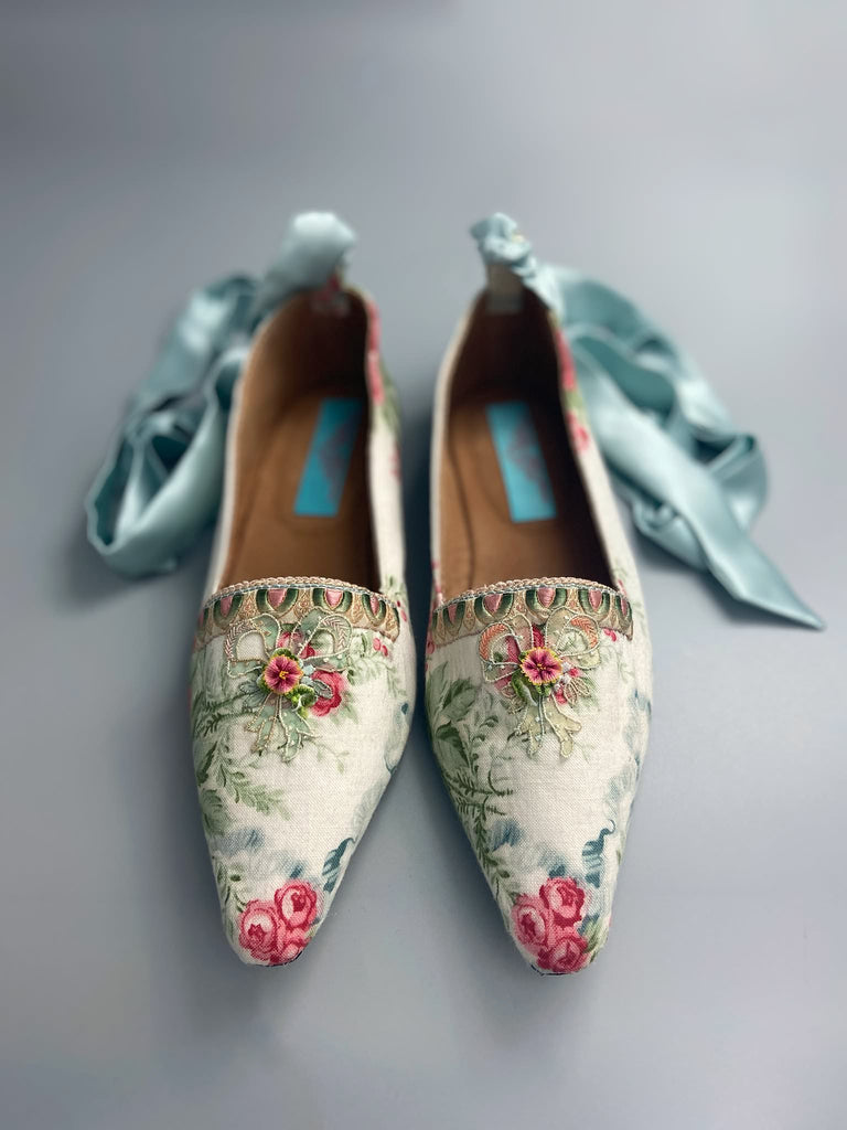 Rosebud toile pointed toe Regency dancing slippers with antique silk appliqué bows and ankle ribbons. Bohemian style created from antique and vintage textiles by Pavilion Parade.