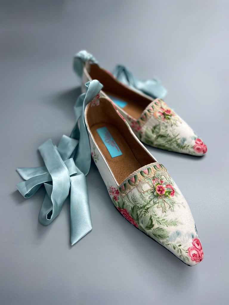 Rosebud toile pointed toe Regency dancing slippers with antique silk appliqué bows and ankle ribbons. Bohemian style created from antique and vintage textiles by Pavilion Parade.