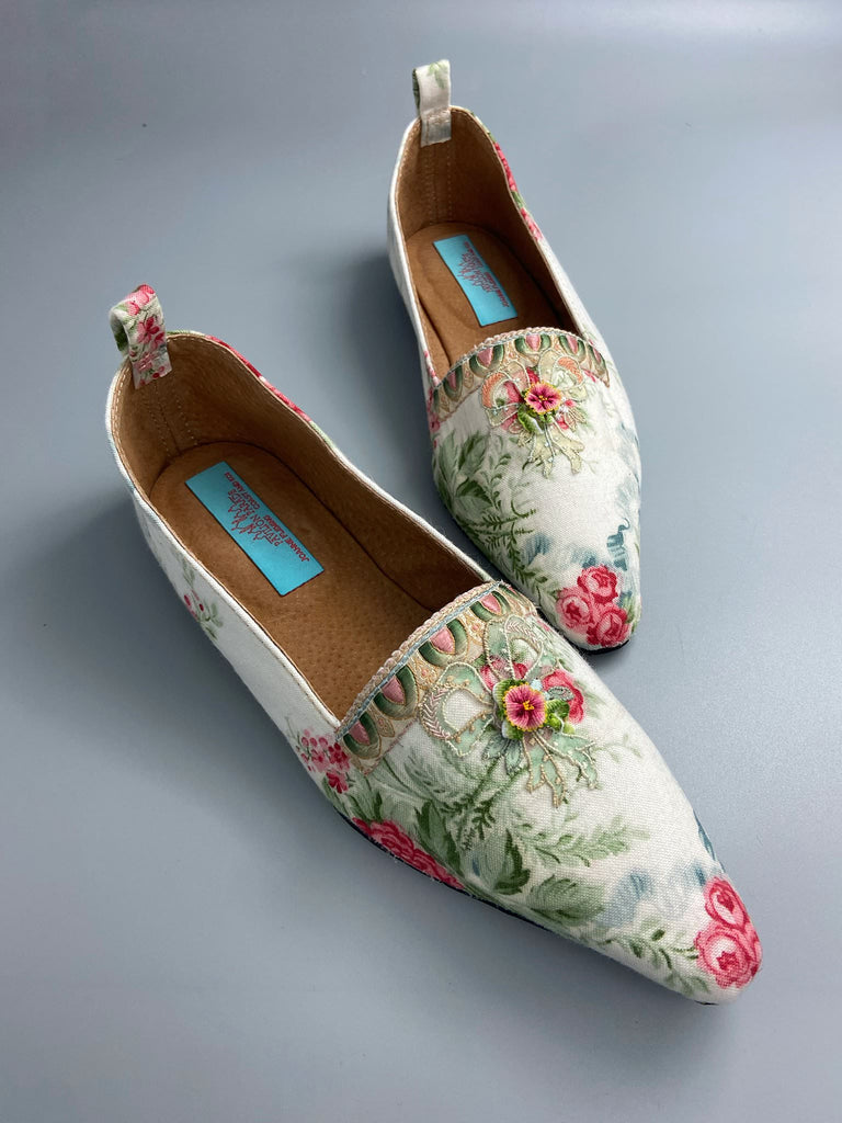 Rosebud toile pointed toe Regency dancing slippers with antique silk appliqué bows and ankle ribbons. Bohemian style created from antique and vintage textiles by Pavilion Parade.